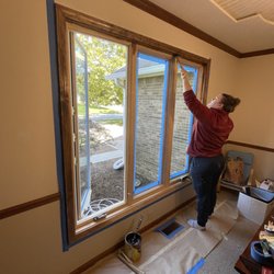 Brothers Painting & Remodeling - Before picture of window being stained and cleared