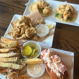 Fish tacos, combo platter which came with fried clams, lobster rolls, chowder (not shown), and I upgraded to truffle fries instead of chips.