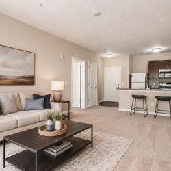 The Heights at Worthington Place - Virtually staged living room and kitchen.