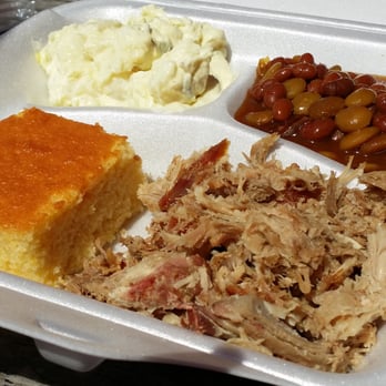 Corolla Village Barbecue - Pulled pork plate with cornbread, baked beans, and potato salad. - Barbeque Near Me - Corolla, North Carolina Corolla Village Barbecue - Pulled pork plate with cornbread, baked beans, and potato salad. - Barbeque Near Me - Corolla, North Carolina
