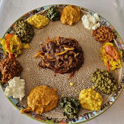 Beteseb Restaurant - Veggies and Awaze tips (Beef with onios and spices)