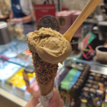Venchi - Pistachio on a baby cone with chocolate and nougatine coating. Yum! - Chocolatiers & Shops Near Me - McLean, Virginia