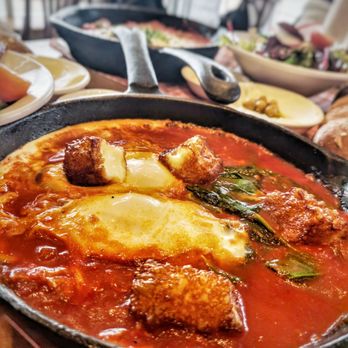 Cafe Landwer - Rutherford & Bathurst - Halloumi Shakshouka. I wonder if they'll let me ask for extra halloumi cheese.. - Cafes Near Me - Maple, Ontario Cafe Landwer - Rutherford & Bathurst - Halloumi Shakshouka. I wonder if they'll let me ask for extra halloumi cheese.. - Cafes Near Me - Maple, Ontario