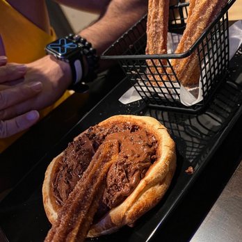 Sfiha's - a pastry and a sandwich on a tray - Brazilian Near Me - Orlando, Florida Sfiha's - a pastry and a sandwich on a tray - Brazilian Near Me - Orlando, Florida