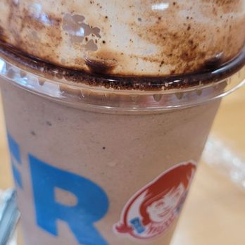 Wendy's - The Oreo Brownie Frosty Fusion has a domed lid that has no purpose. The cup wasn't even full. - Burgers Near Me - Carrollton, Texas Wendy's - The Oreo Brownie Frosty Fusion has a domed lid that has no purpose. The cup wasn't even full. - Burgers Near Me - Carrollton, Texas