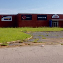 Factory Stores of America - The mall lacks landscaping care, so it does look abandoned, but there are some shops inside.