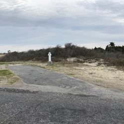 Oregon Inlet National Park Campground - Typical campsite with electric and water.