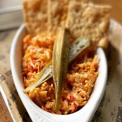 Haw River Tap & Table - Our housemade Pimiento Cheese is served with our own pickled okra and locally-sourced sourdough crackers from our friends at Sour Bakery!