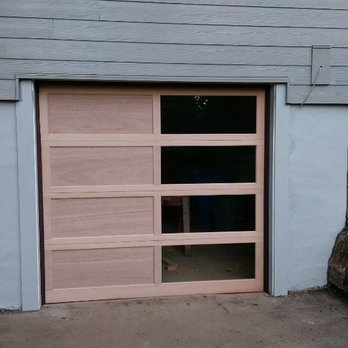 Northwestern Overhead Door - Stainable wood door with virtical tempered glass. - Garage Door Services Near Me - Gresham, Oregon
