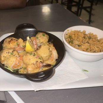 Harry's Seafood Bar & Grille - Baked Stuffed Shrimp & Nola Rice - American Near Me - Ocala, Florida