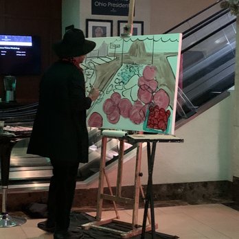 Renaissance Columbus Downtown Hotel - Painter in lobby - Hotels Near Me - Columbus, Ohio Renaissance Columbus Downtown Hotel - Painter in lobby - Hotels Near Me - Columbus, Ohio