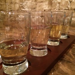 Wine-Nutz - A wine flight, with a little taken off the first glass by an anxious taster.  Delicious!