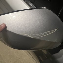 Scratched side mirror