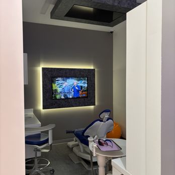 Titus Tang, DDS MAGD - Clean dental room with TVs on the wall & ceiling - General Dentistry Near Me - San Mateo, California