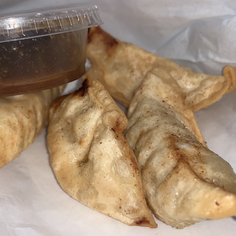Sticky Chicken - 4 piece pot sticker with ginger soy dipping sauce - Food Trucks Near Me - San Marcos, California Sticky Chicken - 4 piece pot sticker with ginger soy dipping sauce - Food Trucks Near Me - San Marcos, California