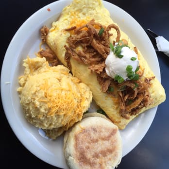 Hudson - Grits were tummy but the brisket omelette is not really the business. Tough. Soggy barley toasted muffin. - New American Near Me - Seattle, Washington