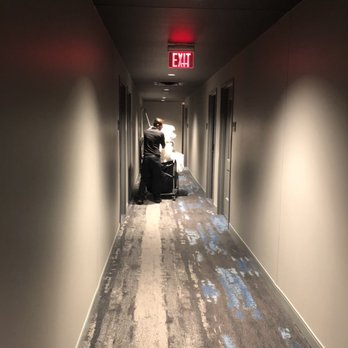 Moxy Atlanta Midtown - Employee picking up dirty linen every morning, 12.27.2019. - Hotels Near Me - Atlanta, Georgia Moxy Atlanta Midtown - Employee picking up dirty linen every morning, 12.27.2019. - Hotels Near Me - Atlanta, Georgia