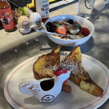 Breakfast Republic - Side of brioche French toast and yogurt bowl - love the little syrup holder! - Breakfast & Brunch Near Me - Palm Desert, California