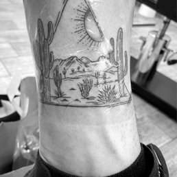 Desert scene on left ankle Desert scene on left ankle