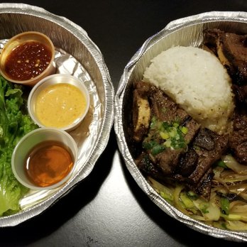 Stone Korean Kitchen - Stone Kalbi: Marinated short ribs grilled over charcoal wood chips served with green leaf lettuce, sauces, and steamed rice ($22) - Korean Near Me - San Francisco, California