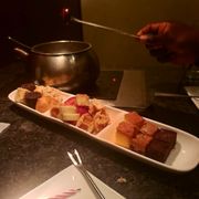 Photo of The Melting Pot - Orlando, FL, United States. Dresser fondue