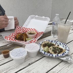 Tacos El Viejo - Quesabirria Tacos with Birria Broth, Beans and Rice, Carne Asada street tacos (2), Horchata, red and green salsas.