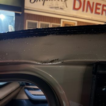 Graziano Auto Collision - SUV window and roof with dent - Body Shops Near Me - East Northport, New York Graziano Auto Collision - SUV window and roof with dent - Body Shops Near Me - East Northport, New York