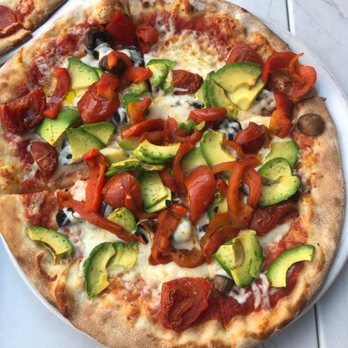 Wooden Heads - With avocado, red pepper, cheese, - Pizza Near Me - Kingston, Ontario Wooden Heads - With avocado, red pepper, cheese, - Pizza Near Me - Kingston, Ontario