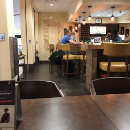 a man sitting at a bar