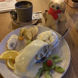 Platzhirsch - Apple strudel with vanilla sauce, ice cream, and fruit.