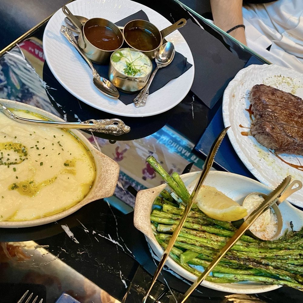 Prime 141 - Classic puréed potatoes, grilled asparagus with white wine butter, Manhattan strip, and 3 sauces - Steakhouses Near Me - Enterprise, Nevada Prime 141 - Classic puréed potatoes, grilled asparagus with white wine butter, Manhattan strip, and 3 sauces - Steakhouses Near Me - Enterprise, Nevada