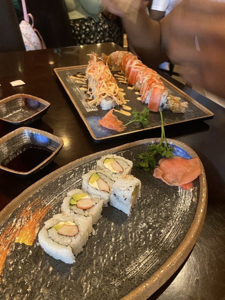 Koizi Endless Hibachi & Sushi Eatery Logo