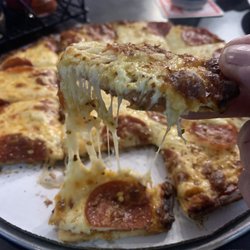 Blue Collar Bar & Grill - Thin crust pepperoni pizza.
