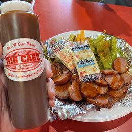 Sausage & Cheese Plate and a bottle of sauce with that classic logo - perfection all around