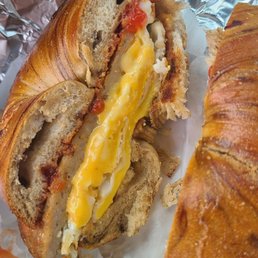 Sausage, egg, and completely melted cheese. Well done
