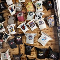 House of Guitars - Ceiling displaying rock tees