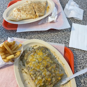 Rick's Burgers - Our food chicken quesadilla & a green chili burrito wet and fries.  Yummy - Burgers Near Me - Rosemead, California