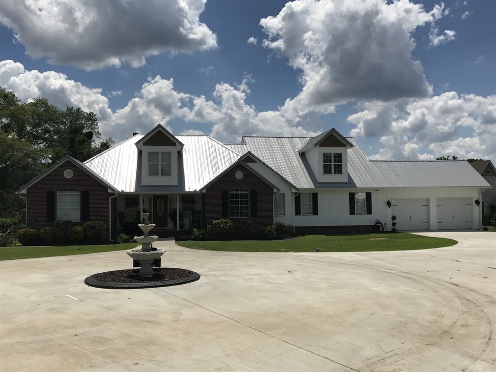 Slide of Whitt's Quality Roofing