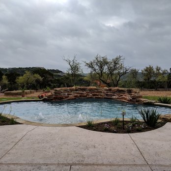 Kevin Wood Landscapes - Natural looking pool with planters on the side. Love! - Landscaping Near Me - Austin, Texas Kevin Wood Landscapes - Natural looking pool with planters on the side. Love! - Landscaping Near Me - Austin, Texas