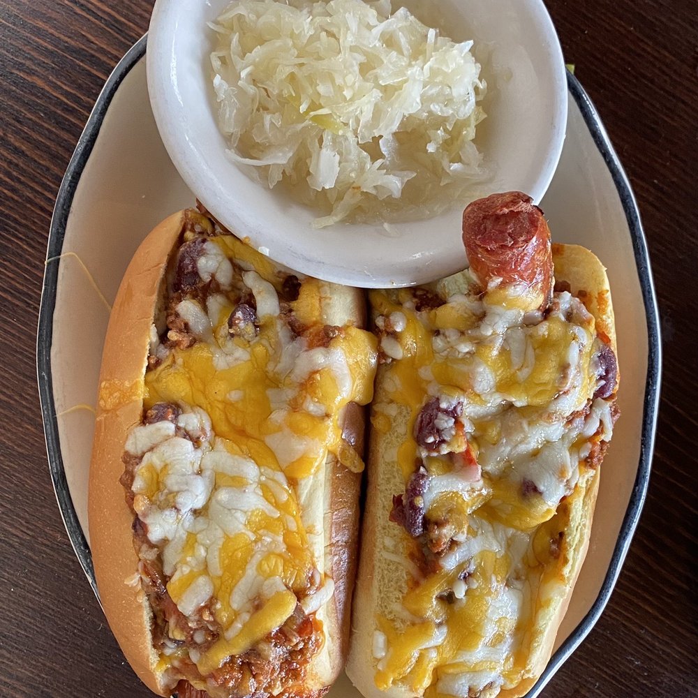 The Dock - Hot dog layered in Chili and different cheeses. - Seafood Near Me - Montauk, New York The Dock - Hot dog layered in Chili and different cheeses. - Seafood Near Me - Montauk, New York