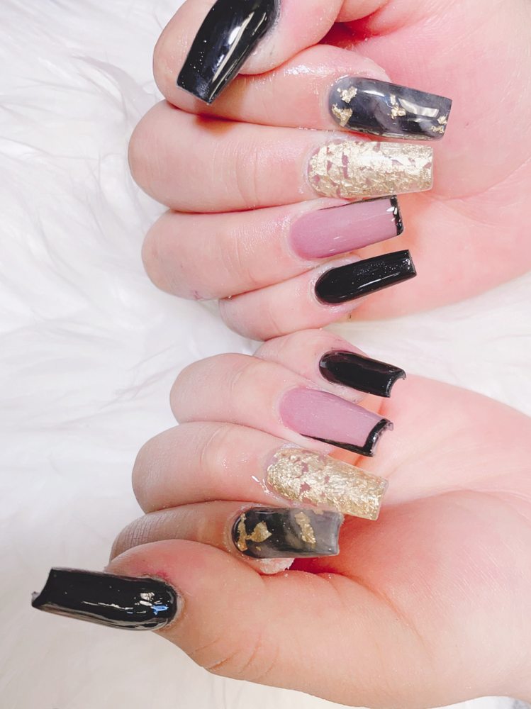 Ms. Nails & Spa Logo