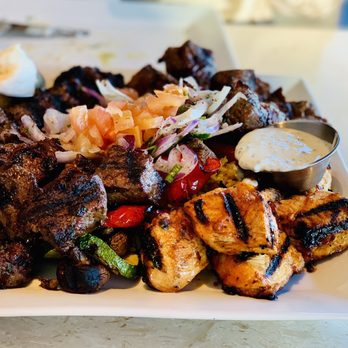 Tanoor - Back at it again for the mixed grill for 2-3 with sides included - Lebanese Near Me - Sammamish, Washington Tanoor - Back at it again for the mixed grill for 2-3 with sides included - Lebanese Near Me - Sammamish, Washington