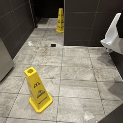 McDonald's - Bathroom reeks, looks like shit and piss on the floor.