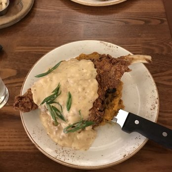 Batch Local Kitchen - Bourbon maple salmon and brussels sprouts bacon with Sweet potatoes, pork chops and sausage gravy on sweet potatoes - Cocktail Bars Near Me - West Palm Beach, Florida