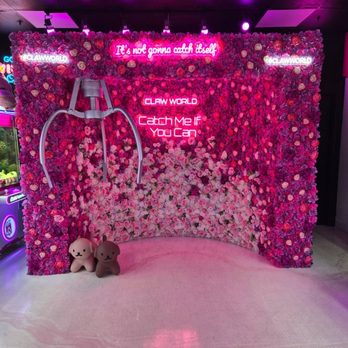 Claw World - Pose at this wall - Arcades Near Me - Las Vegas, Nevada