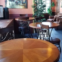 The Daily Grind - A view from the entrance of the high tops. Love the variety of seating options.