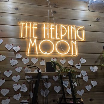 The Helping Moon - A light up sign with the shops name - Gemstones & Minerals Near Me - Reno, Nevada