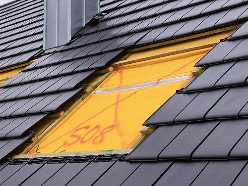 Slide of J & B Roofing Construction