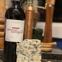 Upper Bench Estate Winery & Creamery - Our Estate Cabernet Sauvignon is the perfect wine to pair with our big, bold and creamy blue cheese. King Cole blue our stilton style blue.