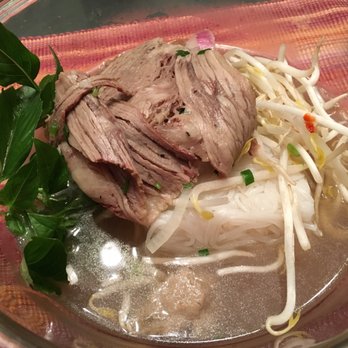 Saigon Kitchen - Beef specialty pho takeout - note the quantity. Not all broth poured into the bowl. They don't skimp out on takeout. - Vietnamese Near Me - Fort Lee, New Jersey Saigon Kitchen - Beef specialty pho takeout - note the quantity. Not all broth poured into the bowl. They don't skimp out on takeout. - Vietnamese Near Me - Fort Lee, New Jersey